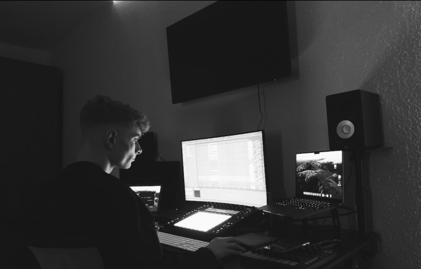 Pluto producing in a studio